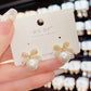 Zircon Bow & Pearl Pendant Earrings